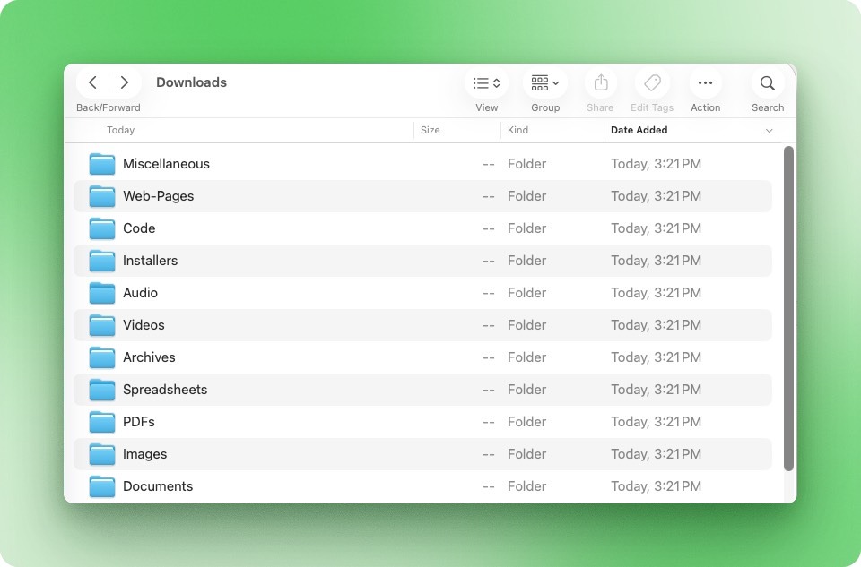 Organized Downloads folder with 11 subfolders created by Claude Cowork