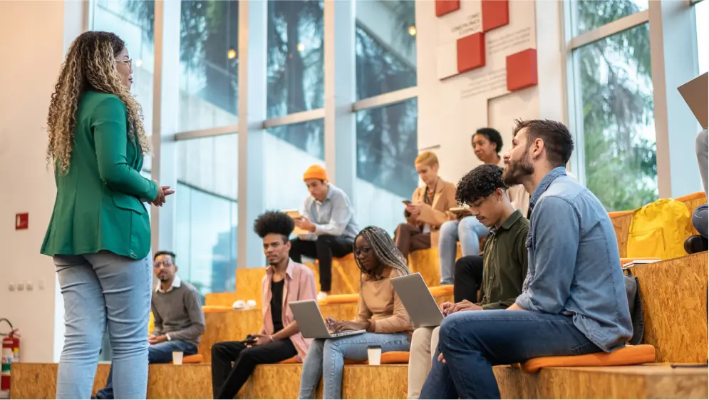 Photo of a teacher and students