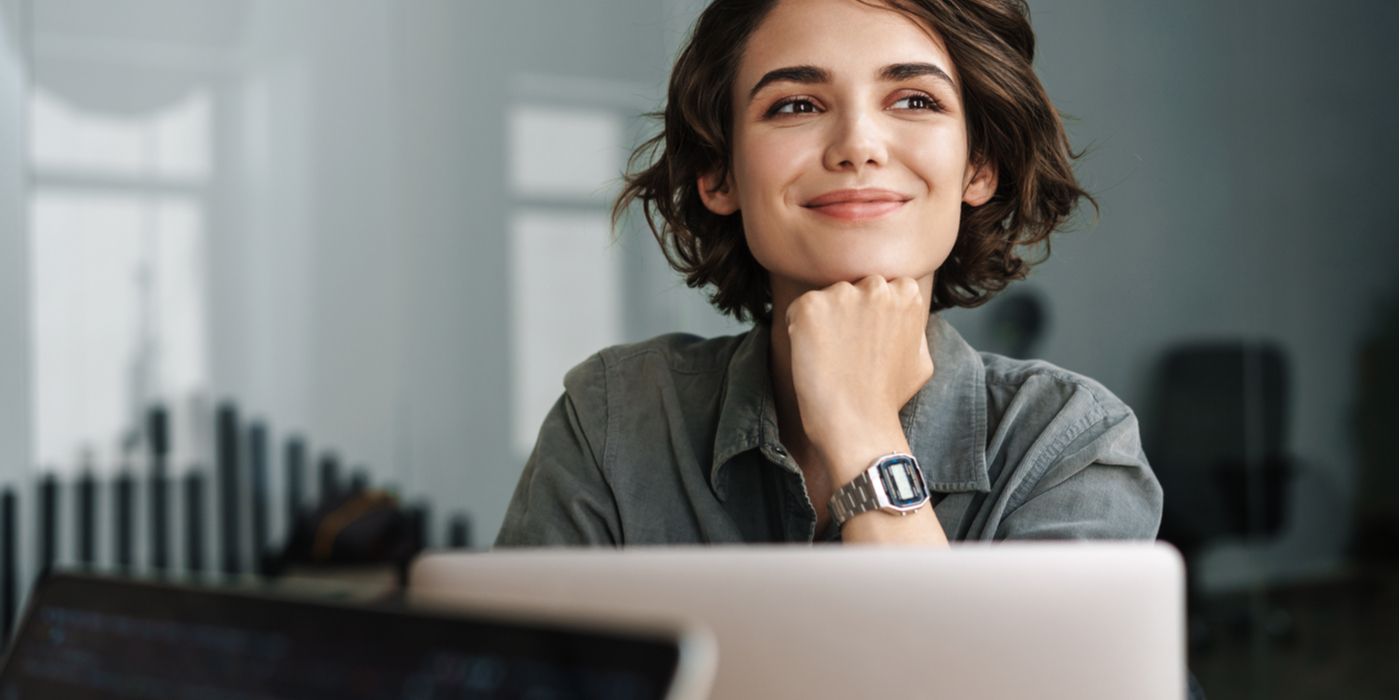 Happy Professional woman with laptop 