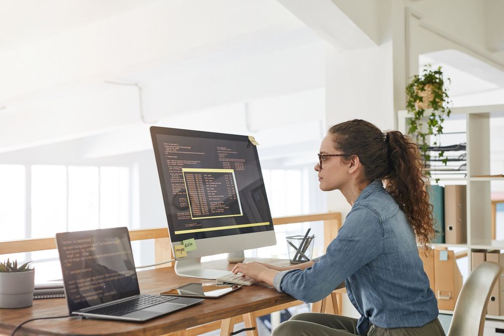 Woman working on code